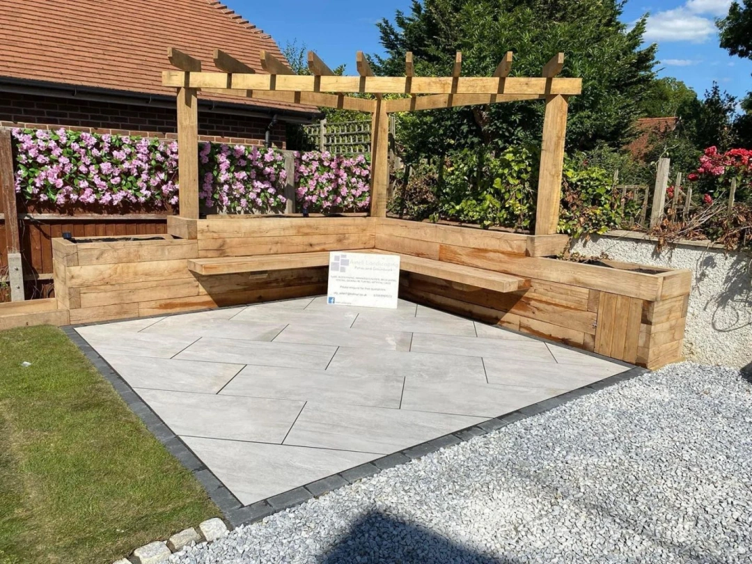 Axtell Landscaping patio with timber pergola, raised beds and built-in bench seating
